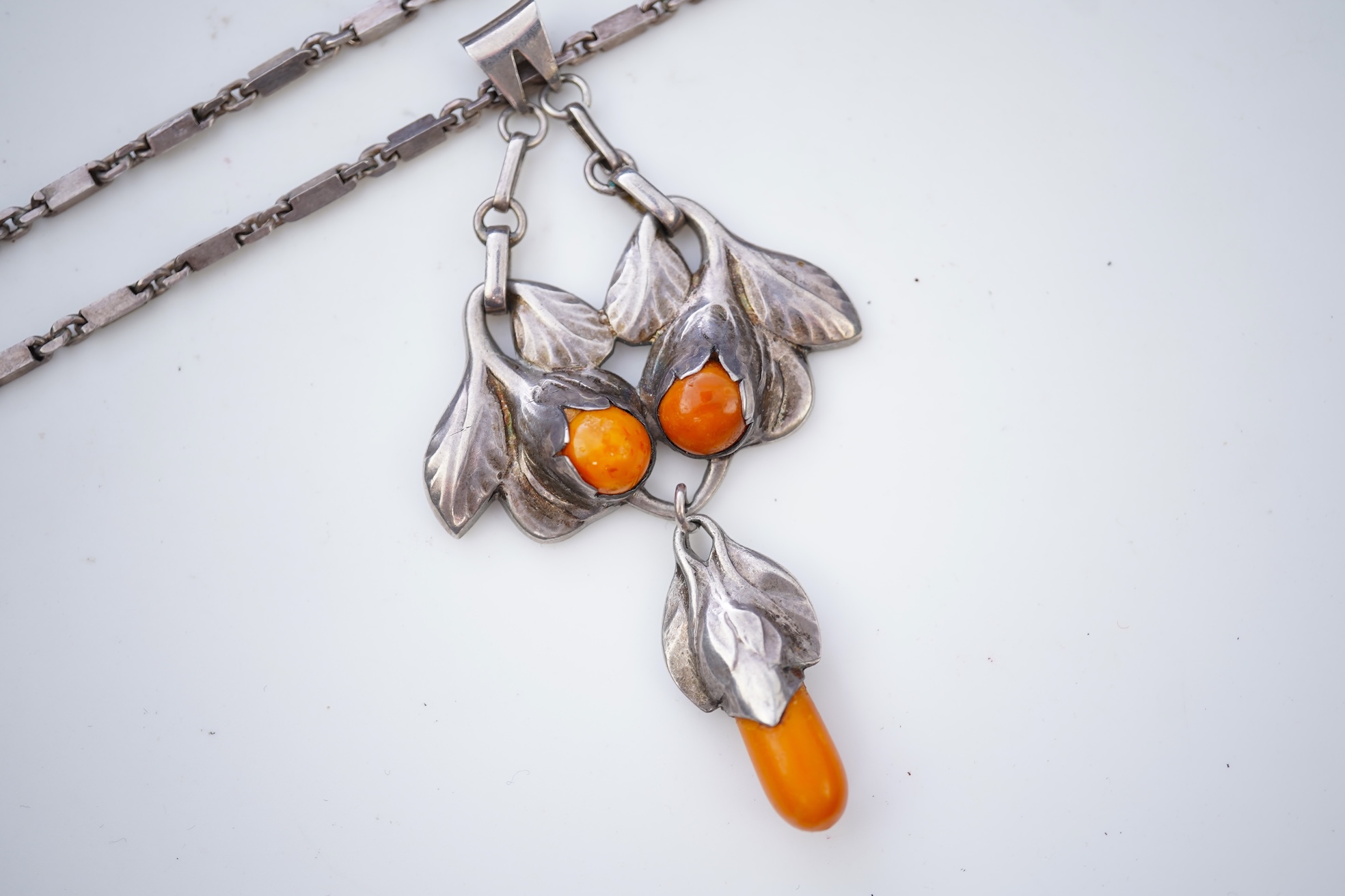 An Arts & Crafts silver and amber necklace, Denmark or Norway, mid 20th century